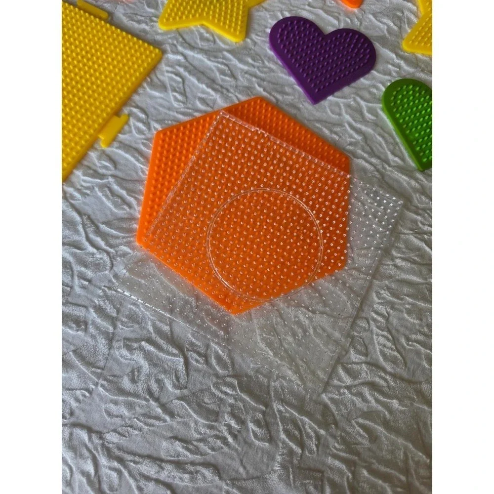 Lot B Perler bead pegboards in various shapes and bright colors